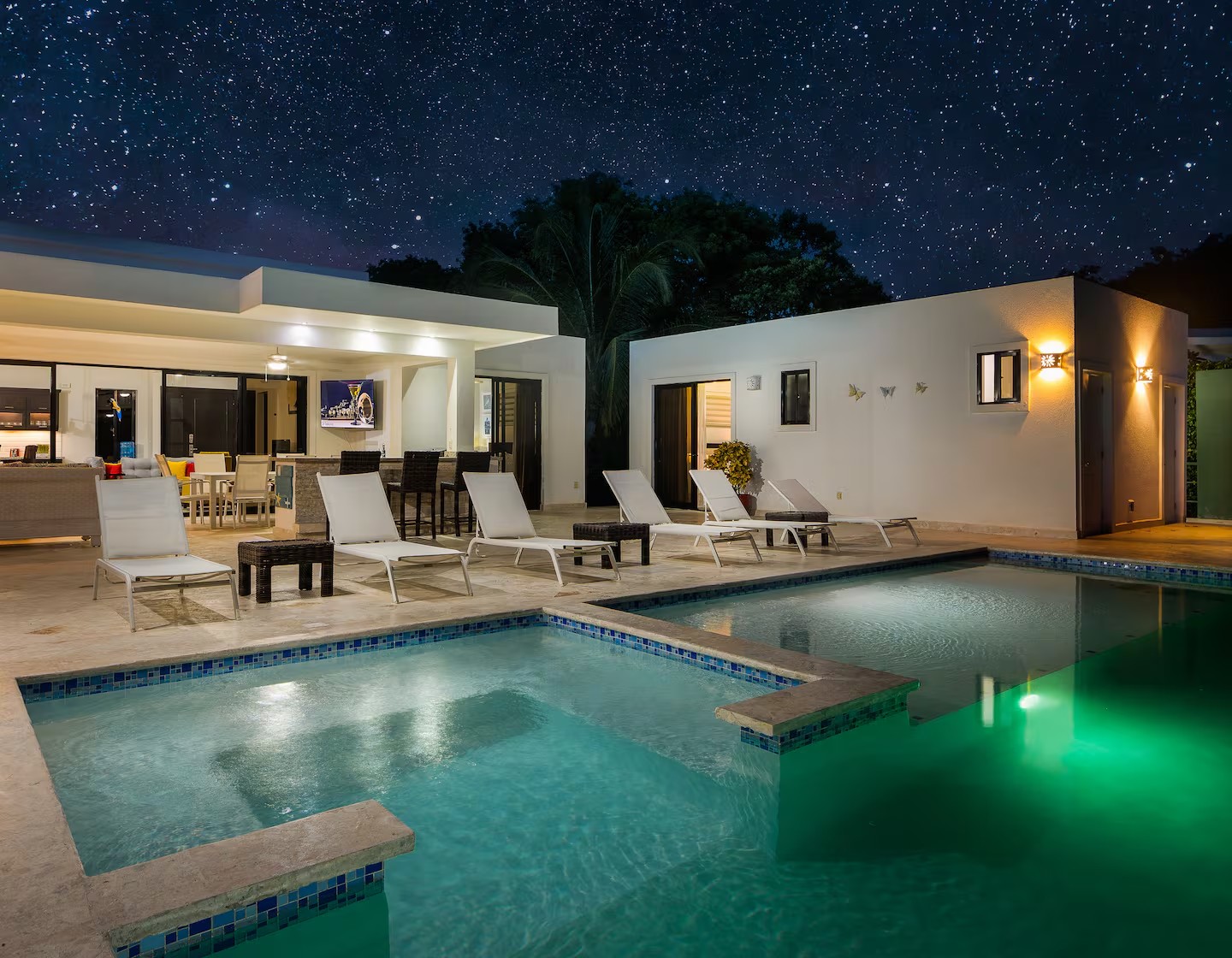 Real SosuaVillas villa exterior with pool and shaded lounge seating